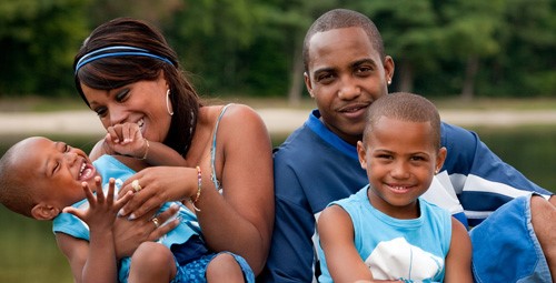 Mother and Father with their two children